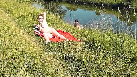 Wild Sexy Milf Platinum Naked Sunbathing On River Bank Random Fisherman Guy Watches Naked In Public...